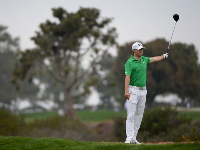 Jordan Spieth hits a tee shot on the 9th hole during the second round of the Farmers Insurance Open on Torrey Pines South on January 24, 2014