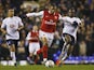 Julio Baptista of Arsenal is challenged by Didier Zokora of Tottenham during the Carling Cup Semi Final 1st leg match on January 24, 2007