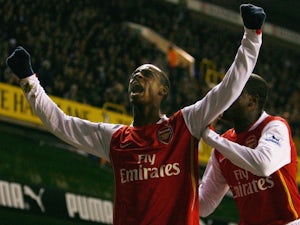 Justin Hoyte (L) of Arsenal celebrates the second Arsenal goal during the Carling Cup Semi Final 1st leg match between Tottenham Hotspur and Arsenal at White Hart Lane on January 24, 2007