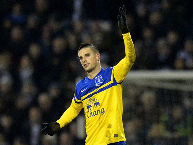 Everton's Kevin Mirallas celebrates after scoring the opening goal against West Brom during their Premier League match on January 20, 2014