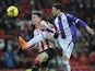 Athletic Bilbao's Kike Sola and Real Valladolid's Oscar Gonzalez in action during their La Liga match on January 20, 2014