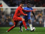 Kristoffer Peterson of Liverpool battles with Kevin Wright of Chelsea during the FA Youth Cup semi final second leg match between Chelsea and Liverpool at Stamford Bridge on April 19, 2013