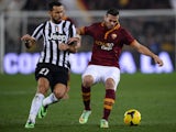AS Roma's Brazilian defender Leandro Castan fights for the ball against Juventus' forward Fabio Quaglierella during their Coppa Italia football match, on January 21 , 2014