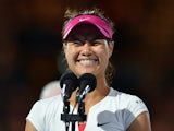 China's Li Na delivers a speech after her victory against Slovakia's Dominika Cibulkova during the women's singles final on day 13 of the 2014 Australian Open tennis tournament in Melbourne on January 25, 2014