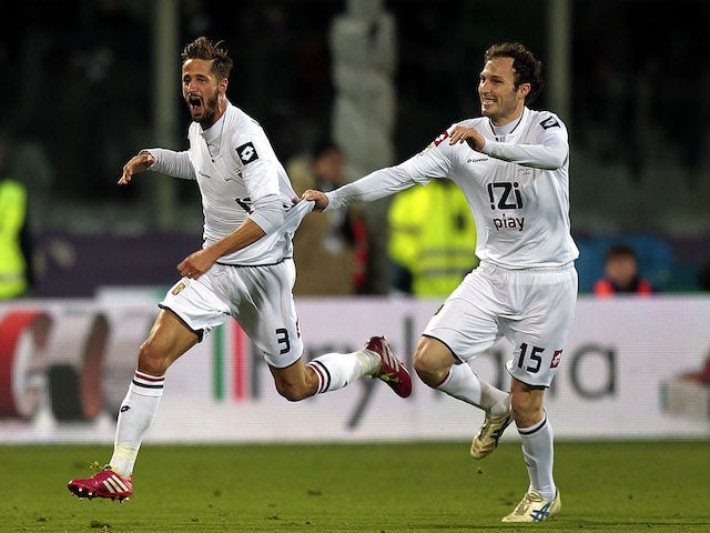 Luca Antonini of Genoa CFC celebrates after scoring their second goal during the Serie A match against ACF Fiorentina on January 26, 2014