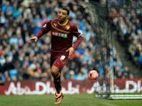 Watford's English forward Troy Deeney celebrates scoring a goal during the English FA Cup fourth round football match between Manchester City and Watford at the Etihad Stadium in Manchester on January 25, 2014