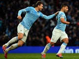 Manchester City's Argentinian striker Sergio Aguero celebrates scoring his second goal during the English FA Cup fourth round football match between Manchester City and Watford at the Etihad Stadium in Manchester on January 25, 2014