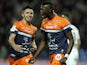 Montpellier's French forward Mbaye Niang (R) reacts after scoring a goal during the French L1 football match Montpellier vs Nice at Mosson stadium in Montpellier, southern France, on January 25, 2014