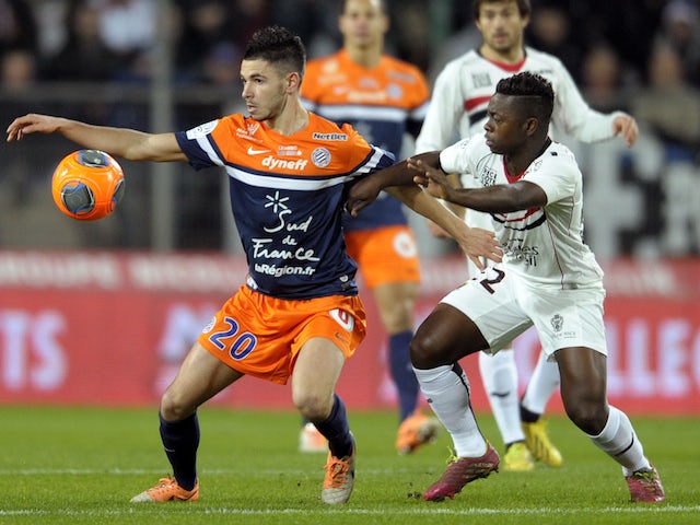 Montpellier's French mifielder Morgan Sanson (L) vies for the ball with Nice's French midfielder Nampalys Mendy during the French L1 football match on January 25, 2014