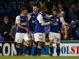 Paul Anderson celebrates with his teammates after scoring to make it 2-0 to Ipswich during the Sky Bet Championship match against Reading on January 25, 2014