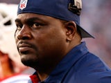 Pepper Johnson, coach of the New England Patriots, watches the action against the New York Jets at Gillette Stadium on October 21, 2012 
