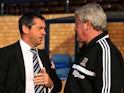 Opposing managers Phil Brown of Southend and Steve Bruce of Hull greet each other prior to kickoff during the FA Cup fourth round match on January 25, 2014