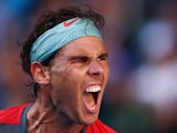 Rafael Nadal roars in celebration during the Australian Open quarter-final against Grigor Dimitrov in Melbourne on January 22, 2014
