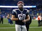 Rob Ninkovich #50 of the New England Patriots runs off the field after defeating the Indianapolis Colts in their AFC Divisional Playoff game at Gillette Stadium on January 11, 2014