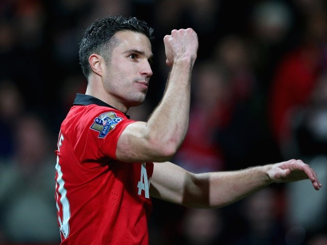 Robin van Persie leaves the pitch after Manchester United defeat Arsenal 1-0 on November 10, 2013.