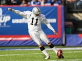 Sebastian Janikowski of the Oakland Raiders in action against the New York Giants during their game at MetLife Stadium on November 10, 2013