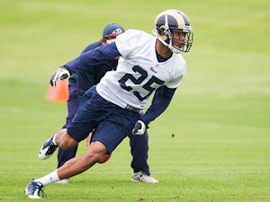 T.J. McDonald (25) of the St. Louis Rams runs for a drill during rookie camp on May 10, 2013