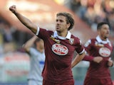 Alessio Cerci of Torino FC celebrates after scoring the opening goal from the penalty spot during the Serie A match between Torino FC and Atalanta BC at Stadio Olimpico di Torino on January 26, 2014