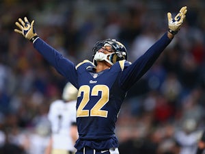 Trumaine Johnson #22 of the St. Louis Rams celebrates after opponents New Orleans Saints missed a field goal in the final minutes on December 15, 2013