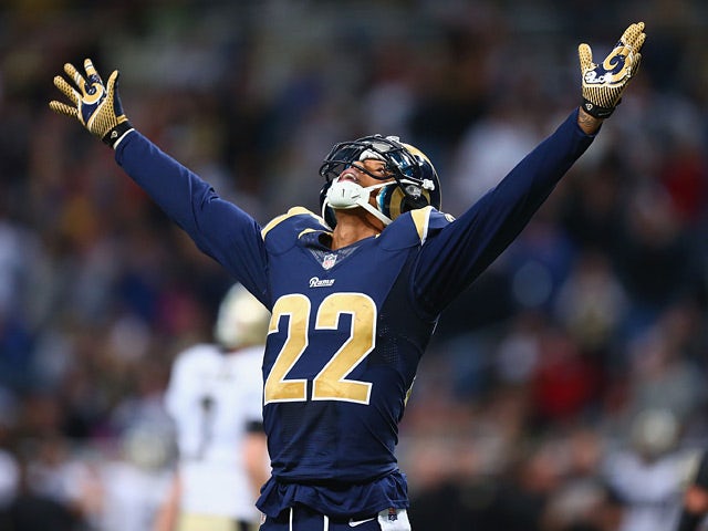 Trumaine Johnson #22 of the St. Louis Rams celebrates after opponents New Orleans Saints missed a field goal in the final minutes on December 15, 2013