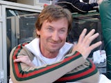 NHL Hall of Famer Wayne Gretzky stands in the dugout at Angel Stadium on April 5, 2010