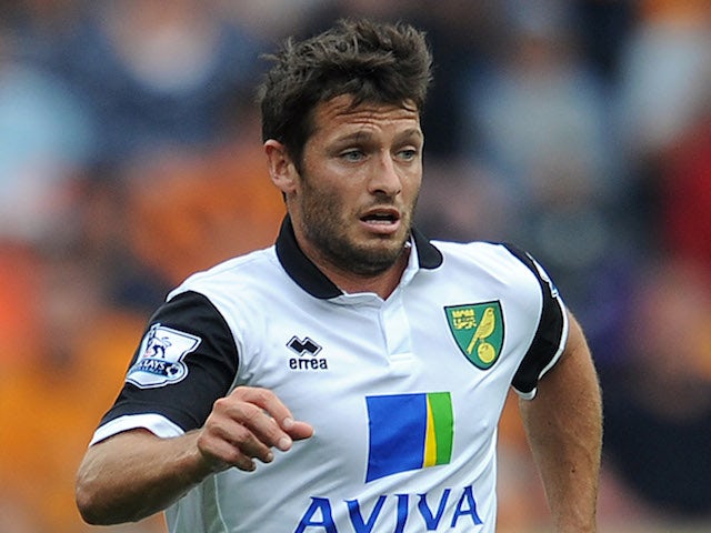 Wes Hoolahan of Norwich City in action during the Barclays Premier League match between Hull City and Norwich City at the KC Stadium on August 24, 2013