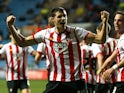 Aaron Martin of Southampton celebrates with team-mates after scoring his side's second goal during the FA Cup 3rd round match between Coventry City and Southampton at the Ricoh Arena on January 07, 2012