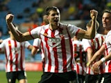 Aaron Martin of Southampton celebrates with team-mates after scoring his side's second goal during the FA Cup 3rd round match between Coventry City and Southampton at the Ricoh Arena on January 07, 2012