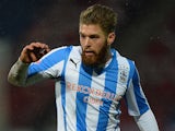 Adam Clayton of Huddersfield Town in action during the Budweiser FA Cup Fourth Round match against Charlton Athletic on February 1, 2014