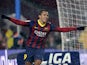 Barcelona's Alexis Sanchez celebrates after scoring his team's third goal against Levante during their Copa del Rey quarter-final match on January 29, 2014