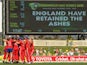 England celebrate after winning the match and retaining the Ashes during game one of the International Twenty20 series between Australia and England at Blundstone Arena on January 29, 2014