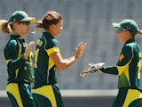 Jess Jonassen of Australia celebrates the wicket of Natalie Sciver of England during game two of the International Twenty20 series between Australia and England at Melbourne Cricket Ground on January 31, 2014