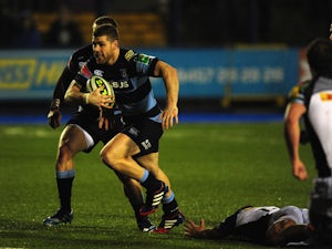 Blues centre Gavin Evans races through to score the second try during the LV= Cup match between Cardiff Blues and Harlequins at Cardiff Arms Park on January 31, 2014