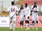 Innocent Emeghara of Livorno celebrates with his team-mates after scoring the opening goal during the Serie A match between Calcio Catania and AS Livorno Calcio at Stadio Angelo Massimino on February 2, 2014 
