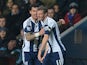 West Brom's Chris Brunt celebrates with teammate Liam Ridgewell after scoring the opening goal against Aston Villa during their Premier League match on January 29, 2014