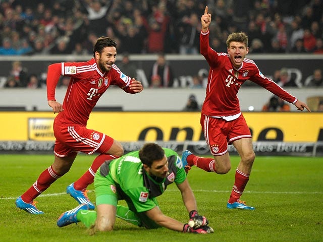Bayern Munich's Claudio Pizarro celebrates after scoring his team's first goal against Stuttgart during their Bundesliga match on January 29, 2014