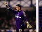 Oldham keeper Dean Bouzanis in action during the FA Cup Fifth Round Replay between Everton and Oldham Athletic at Goodison Park on February 26, 2013