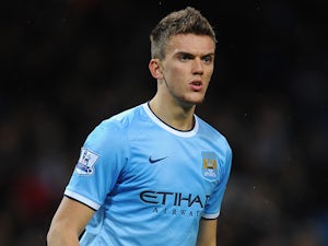 Wigan sign Emyr Huws from Man City