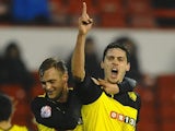 Gabriele Angella of Watford celebrates his first half goal during the Sky Bet Championship match between Nottingham Forest and Watford at City Ground on January 30, 2014
