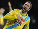 Napoli's Gonzalo Higuain celebrates after scoring the opening goal against Lazio during their Coppa Italia match on January 29, 2014