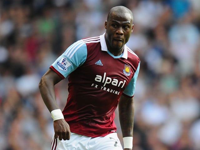 Guy Demel of West Ham in action during the Barclays Premier League match between Tottenham Hotspur and West Ham United at White Hart Lane on October 6, 2013