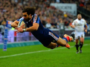 Jean Marc Doussain of France goes over to score their second try during the RBS Six Nations match between France and England at Stade de France on February 1, 2014