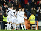 Real's Jese Rodriguez Ruiz celebrates with teammates after scoring the opening goal against Espanyol during their Copa del Rey quarter-final match on January 28, 2014