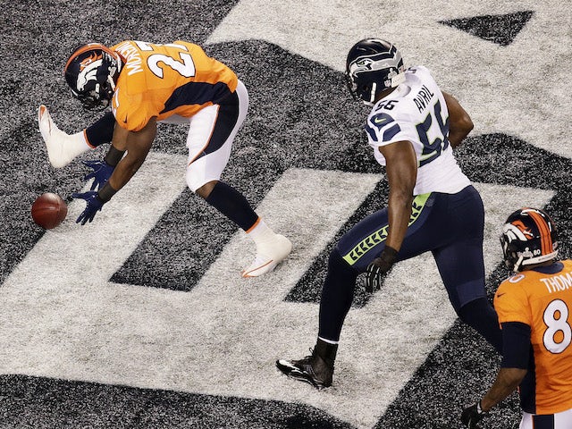 Running back Knowshon Moreno of the Denver Broncos recovers the ball in the endzone for a safety against the Seattle Seahawks on February 2, 2014