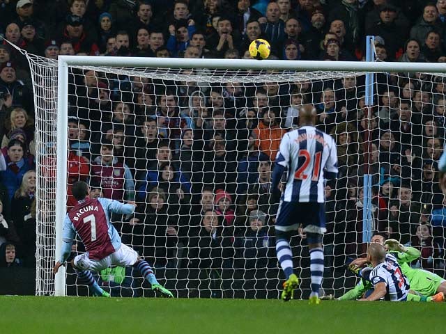 Aston Villa's Leandro Bacuna scores his team's second goal against West Brom during their Premier League match on January 29, 2014