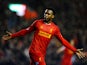 Daniel Sturridge of Liverpool celebrates after scoring his team's second goal during the Barclays Premier League match between Liverpool and Everton at Anfield on January 28, 2014