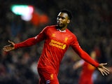 Daniel Sturridge of Liverpool celebrates after scoring his team's second goal during the Barclays Premier League match between Liverpool and Everton at Anfield on January 28, 2014