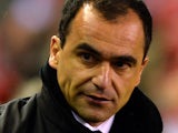 Everton's Spanish manager Roberto Martinez arrives for the English Premier League football match between Liverpool and Everton at the Anfield stadium in Liverpool, northwest England, on January 28, 2014