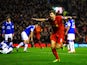 Steven Gerrard of Liverpool celebrates after scoring the opening goal during the Barclays Premier League match between Liverpool and Everton at Anfield on January 28, 2014