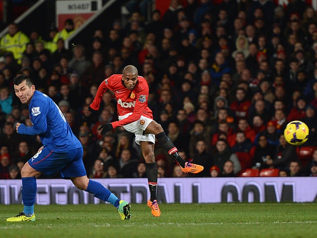 Ashley Young of Manchester United scores his team's second goal during the Barclays Premier League match between Manchester United and Cardiff City at Old Trafford on January 28, 2014